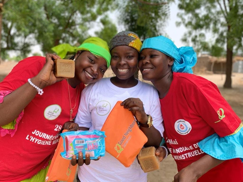 Happy participants after receiving menstrual hygiene kits from good neighbors Cameroon